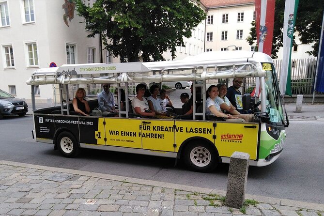 Graz city tours - A flowery street and the Graz Opera