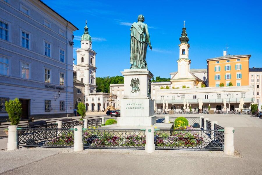 Salzburg: Old Town, Mozart, & Mirabell Gardens Walking Tour - Salzburg Cathedral and the power of Residenzplatz