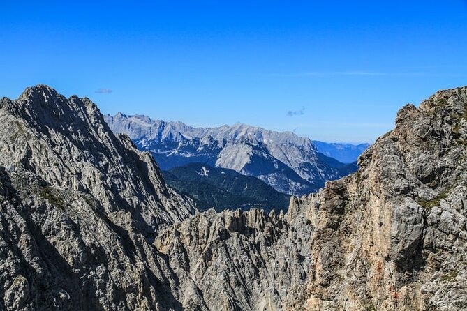 Self-Guided 1,5-hour Tour of Innsbruck: Exciting Stories, Photo Spots & Desserts - Nordkette stations and Bergisel Ski Jump