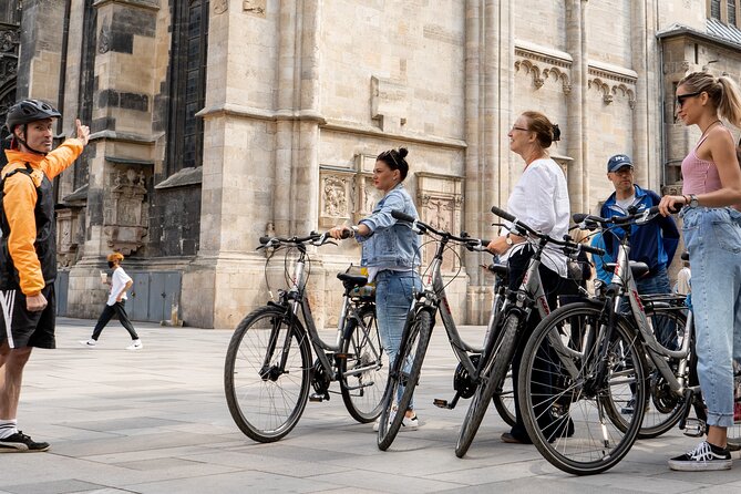 Vienna by bike in small groups max 12pax - Michaelerplatz, the Opera, and the imperial center