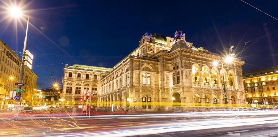 Vienna: Panoramic Night Tour by Bus - Belvedere Palace from a moving bus